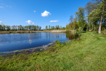recreation camping area by the blue lake in sunny summer day