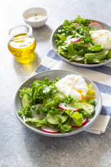 Fresh vegetable salad and poached eggs