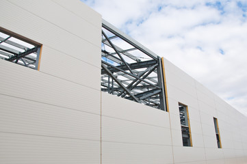 Sandwich panels at the construction site. Insulation of the walls of the building panels of insulation.