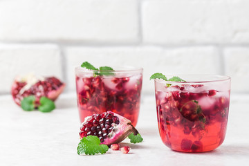 Pomegranate kombucha cocktail. Selective focus, space for text.