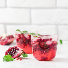 Pomegranate kombucha cocktail. Selective focus, space for text.