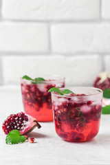 Pomegranate kombucha cocktail. Selective focus, space for text.