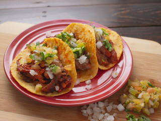 Soft Tortilla Tacos with Spicy Sauce and Tomato Onion and Cilantro 