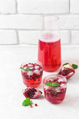 Festive pomegranate kombucha mocktaill. Selective focus, space for text.