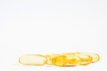 Omega 3 fish oil capsules. Concept of healthcare.  Copy space.
