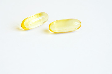 Omega 3 fish oil capsules. Concept of healthcare.  Copy space.