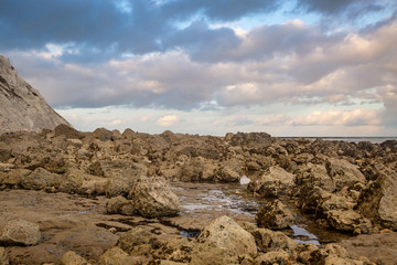 Fototapeta na wymiar The rocky beach near Beachy Head on the Sussex coast, at low tide