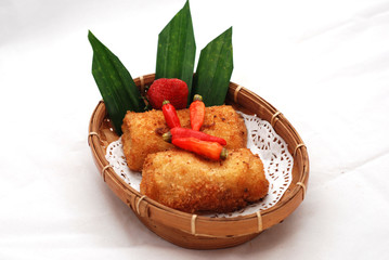 Fried brown mayonnaise cake with a long, coarse-textured shape