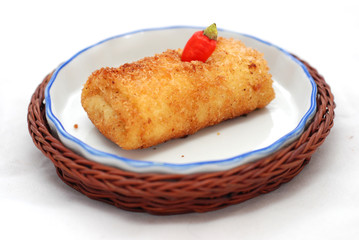 Fried brown mayonnaise cake with a long, coarse-textured shape