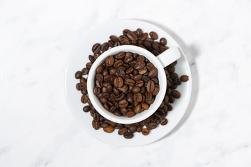 conceptual photo of a cup of coffee beans