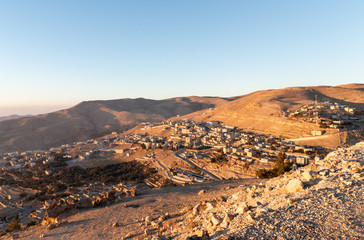 Fototapeta na wymiar Jordan landscape with a small town in the middle of the mountains