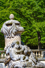 A beautiful fountain in the Jardin de la fontaine in Nimes, France