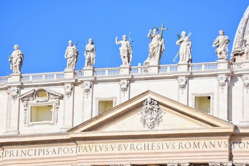 Fototapeta premium Saint Statues on Top of St. Peter's Basilica in Vatican City
