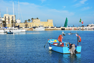 Fishing boats in the old harbor of Bari on the Adriatic sea coast, Puglia region, Italy. 