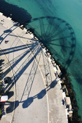Beautiful landscape and panorama with the view of Adriatic sea , lungomare Bari and wheel's shadow , Pugia region , Italy. 