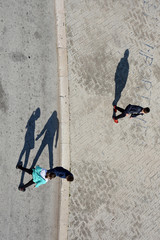 Birds eye view street photography with light and shadow taken from panorama wheel , on the shore of Adriatic sea, lungomare and Murat district in Bari, Puglia region , Italy