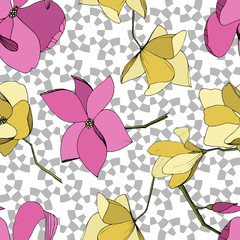 Vector Magnolia floral botanical flowers. Purple and yellow engraved ink art. Seamless background pattern.