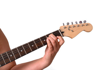 A woman is playing an electric guitar