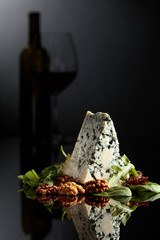 Blue cheese with walnuts, greens and red wine.