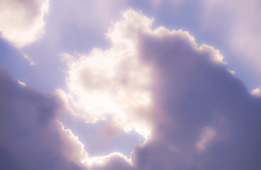Fototapeta na wymiar 雲の隙間から光が差し込むイメージ