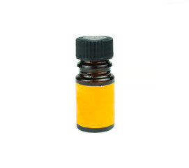 Little bottle with solvent for medicine with black cap with yellow tag isolated over white