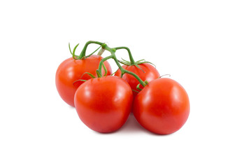 Cherry tomatoes are isolated on a white background