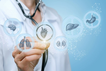 The doctor examines the mechanism of human health.