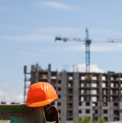 Plastic hard hat in the construction site