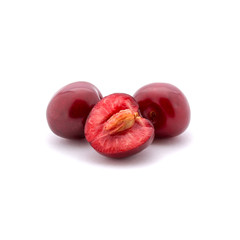 Photo of red cherries isolated on white background