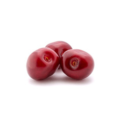 Photo of red cherries isolated on white background