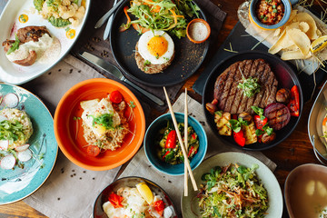 Composition of European dishes on a wooden table