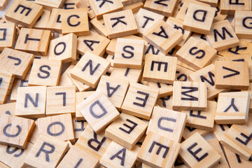 Heap of Assorted Uppercase Scrabble Letter Tiles