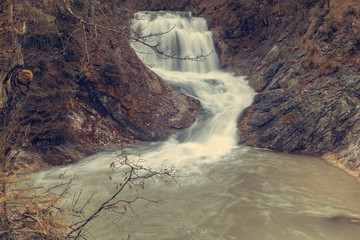Waterfall in the forest in autumn