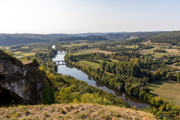 Fototapeta na wymiar View of the River Dordogne and the Dordogne Valley from the walls of the old town of Domme, Dordogne, France