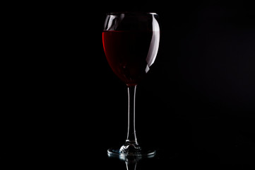 Fototapeta na wymiar glass of red wine