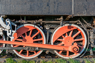 Fototapeta na wymiar Old steam locomotive red wheel of the train, vintage train
