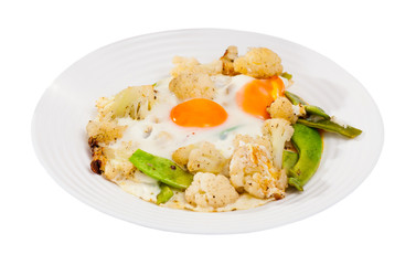 Appetizing cauliflower fried eggs for breakfast