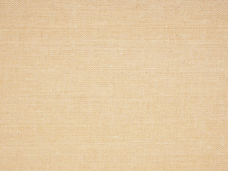 Beige textile book cover. Suitable for background. Close-up