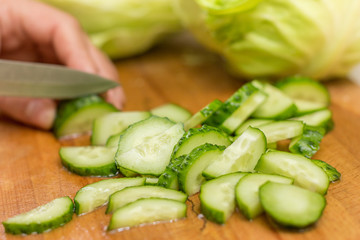  slicing vegetable salad (cutting cucumbers)
