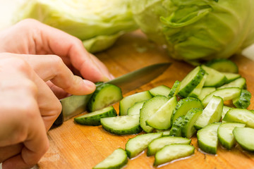  slicing vegetable salad (cutting cucumbers)