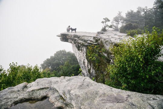 Hiker at McAfee Knob Along the Appalachian Trail on Catawba Mountain in Virginia