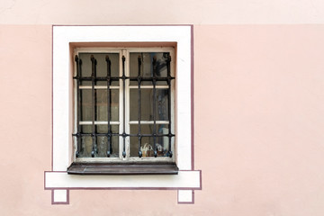 Fototapeta na wymiar Window on pink wall.