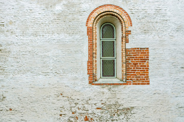 Narrow arched window.