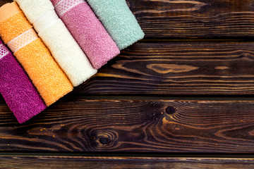 high quality cotton towels set on wooden background top view mock up