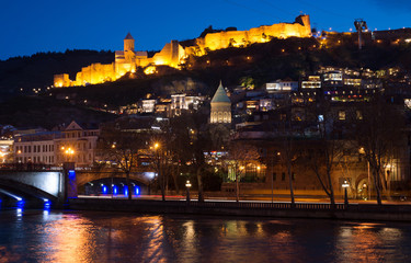 Fototapeta na wymiar Cityscape of night Tbilisi, Georgia. The main object of the photo is Narikala fortress, the streets of the old city.