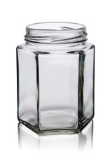 empty glass jar of a six-sided form with reflection on a white background