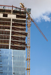 Office building construction. Mirror windows.