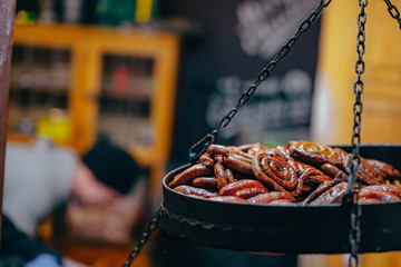 Two tier grill with delicious spiral sausages