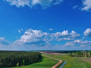 Aerial view of green field  in Minsk Region of Belarus