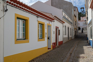 Old houses in the small streets of Odeceixe at the Algarve, Portugal.